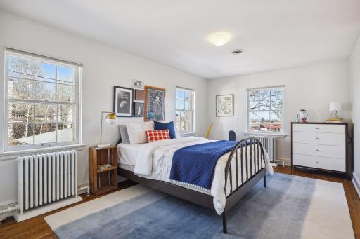 2nd floor kids wing bedroom with Basilica and Minneapolis skyline views