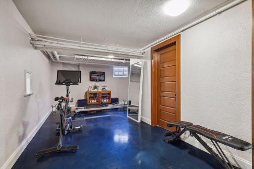 Basement gym with TV included