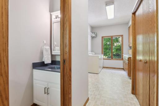 Main level Half Bath/Powder Room - Easily Access from Home, Garage, Deck and Yard