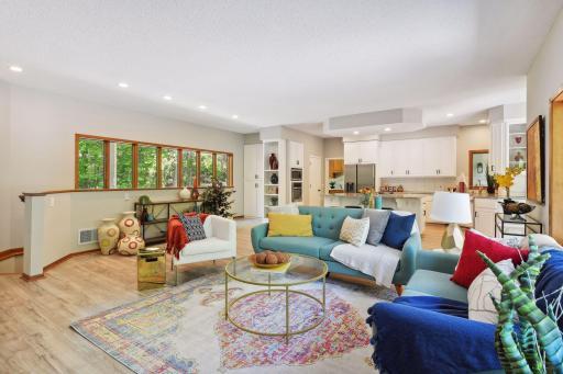 Beautiful New Maintenance Free Flooring in Family Room, Kitchen, Dining and Foyer