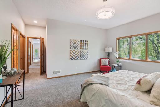 Primary Bedroom has private 3/4 bath, walk-in closet and additional storage closet