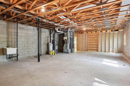 Mechanicals are all conveniently located in one corner to maximize livable space. There is plumbing for 2nd laundry if desired.