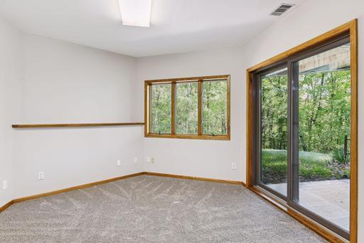 Office/Den/Flex Room has patio doors leading to large patio area