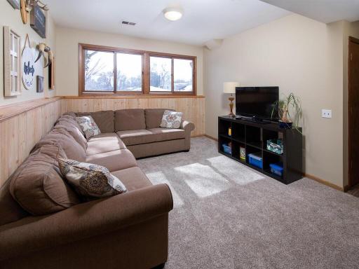 Lower level family room with newer carpet & fresh paint
