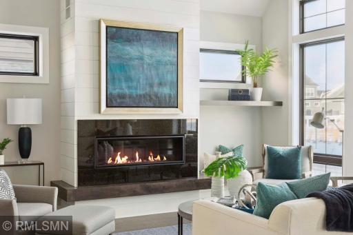 Architectural fireplace with shiplap walls