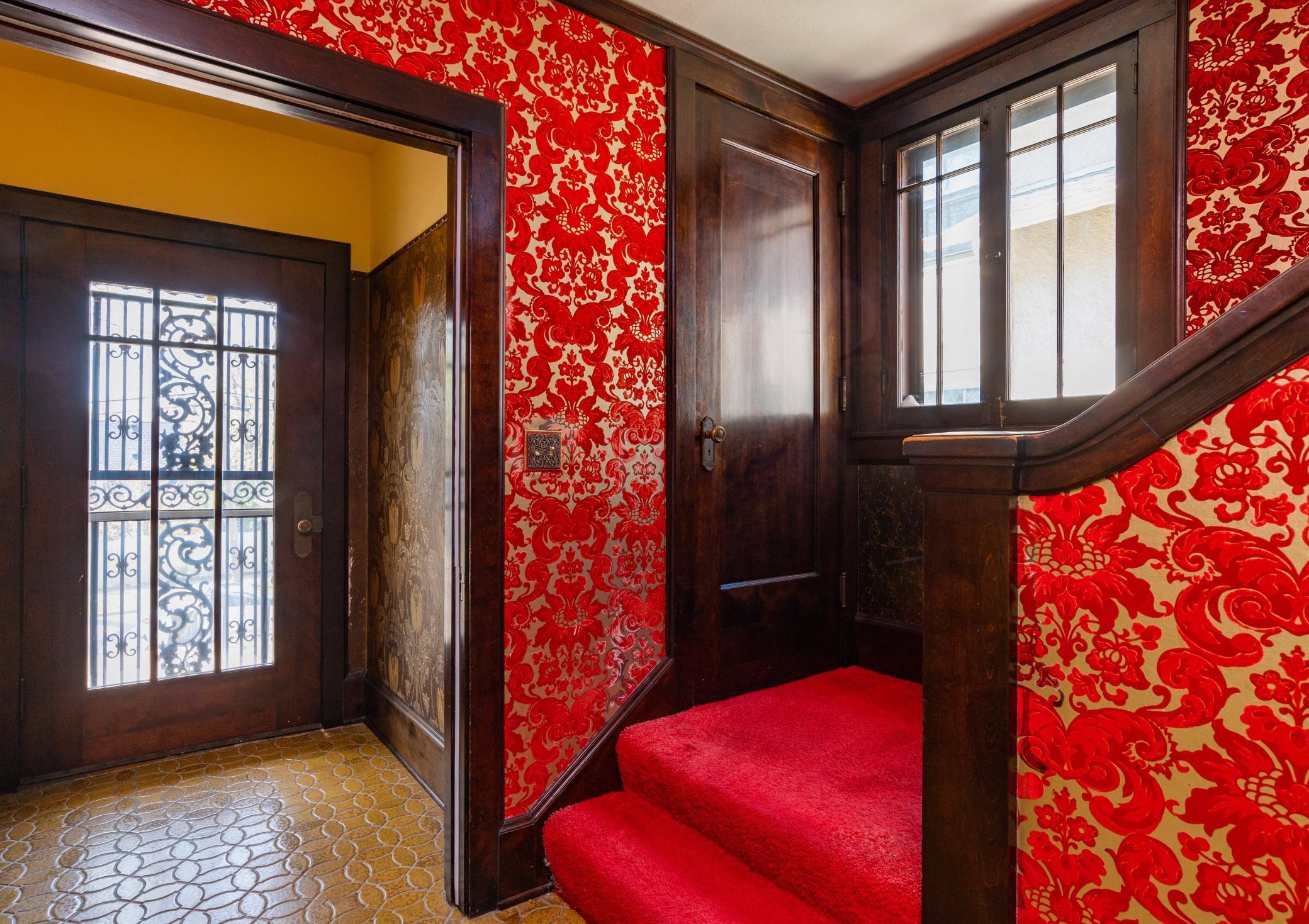 Gracious Front Entry Area With Beautiful Woodwork