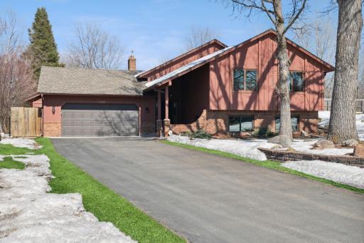 Well maintained home inside and out! Tandem 4 car garage and large driveway.