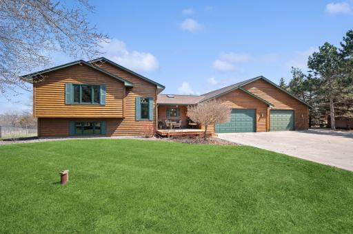 Beautiful home on 8.25 private acres in prime Elk River location