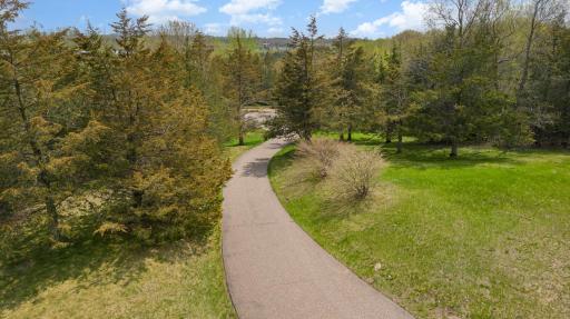 Build the home of your DREAMS on this beautiful, wooded lot! The driveway leads you through the trees to your private home.
