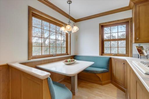 Kitchen is open to the informal dining room with a convenient built-in breakfast nook.