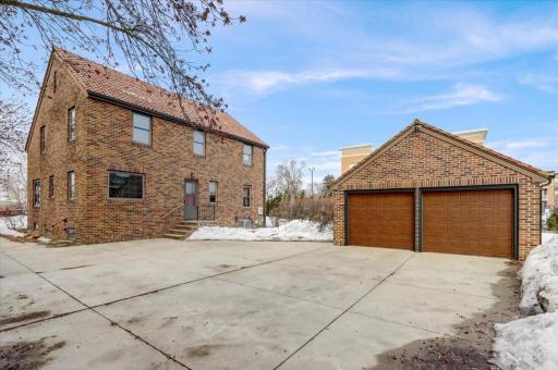 Great for Minnesota’s winters is a detached 2-car garage with a concrete driveway.
