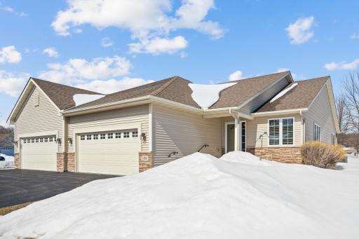 Welcome to stunning and spacious townhome living with views of Buffalo Lake.