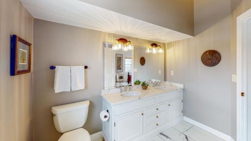 Stunning Owners Suite with Double Sinks, New Quartz Vanity Top, Vanity Painted, New Flooring
