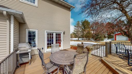 Enjoy your tiered maintenance free deck overlooking the property.
