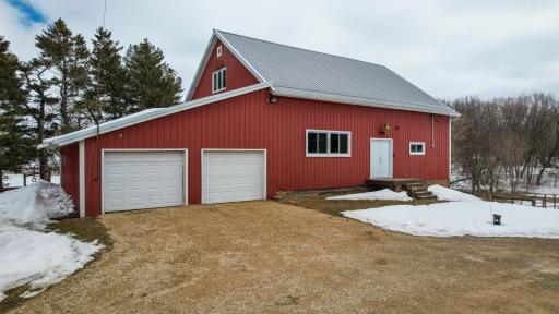 Post and Beam Barn that has 2 Garages which could fit 6 vehicles, Heated Workshop, Loft with 2 Separate Rooms