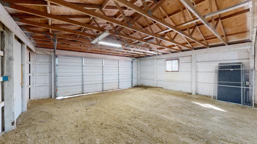 One of Two of the Garage Spaces Attached to Post and Beam Barn