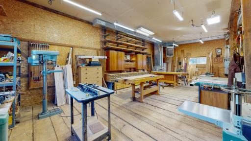 Inside the Post and Beam Barn - Heated Area. All Shop Tools and Storage Cabinets Do Not Stay with Sale. It will be a Large Open Area for a Craft Working Area, Gathering Place, Wedding or Meeting Venue -Your Only Limited by Your Own Imagination!