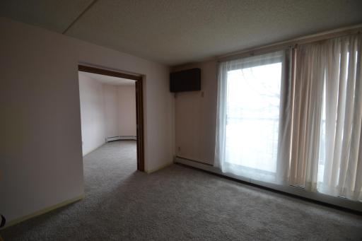 Second Bedroom or Den With French Doors with New Carpet
