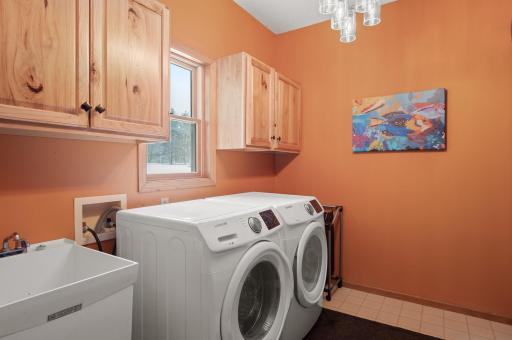 Convenient Main Floor Laundry Room with front load washer & dryer!