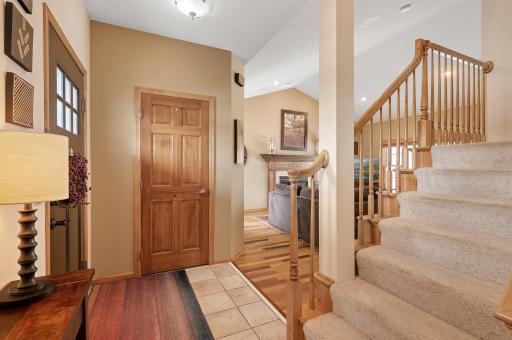Convenient coat closet, opens to Great Room and stairs to upper level.