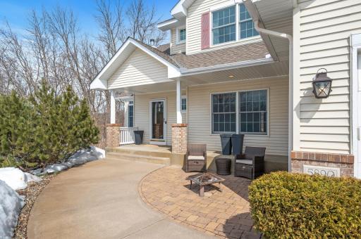 Welcoming Front Porch and paver patio is perfect for sunshine sitting!