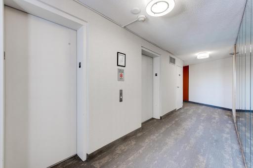 It's rare to wait long to catch an elevator! The trash closet is located to the right of the elevators and is very clean.