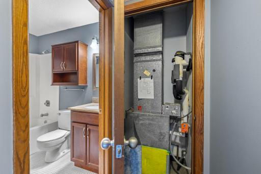 The furnace is conveniently tucked away in this utility closet. The building maintenance personnel will change your filter for you monthly if desired.