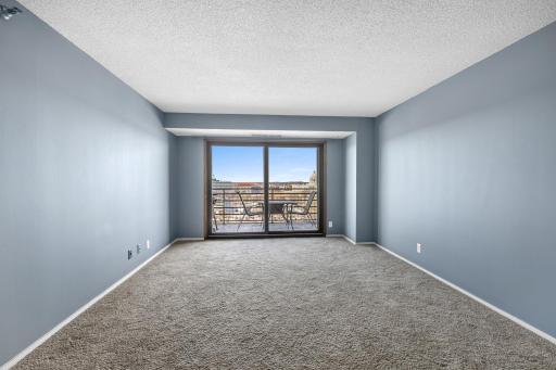 Spacious and bright living room with fantastic 19th floor views.