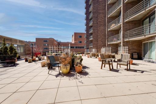 Alternate view of the shared patio. In the summer this space is adorned with gorgeous flowers and plants.