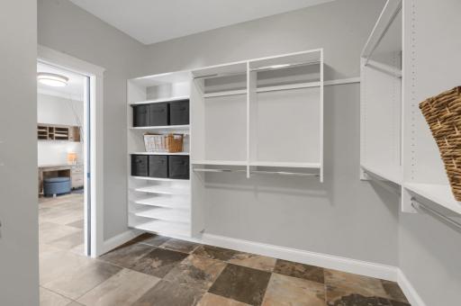 Mud room closet with built-ins and wall hooks