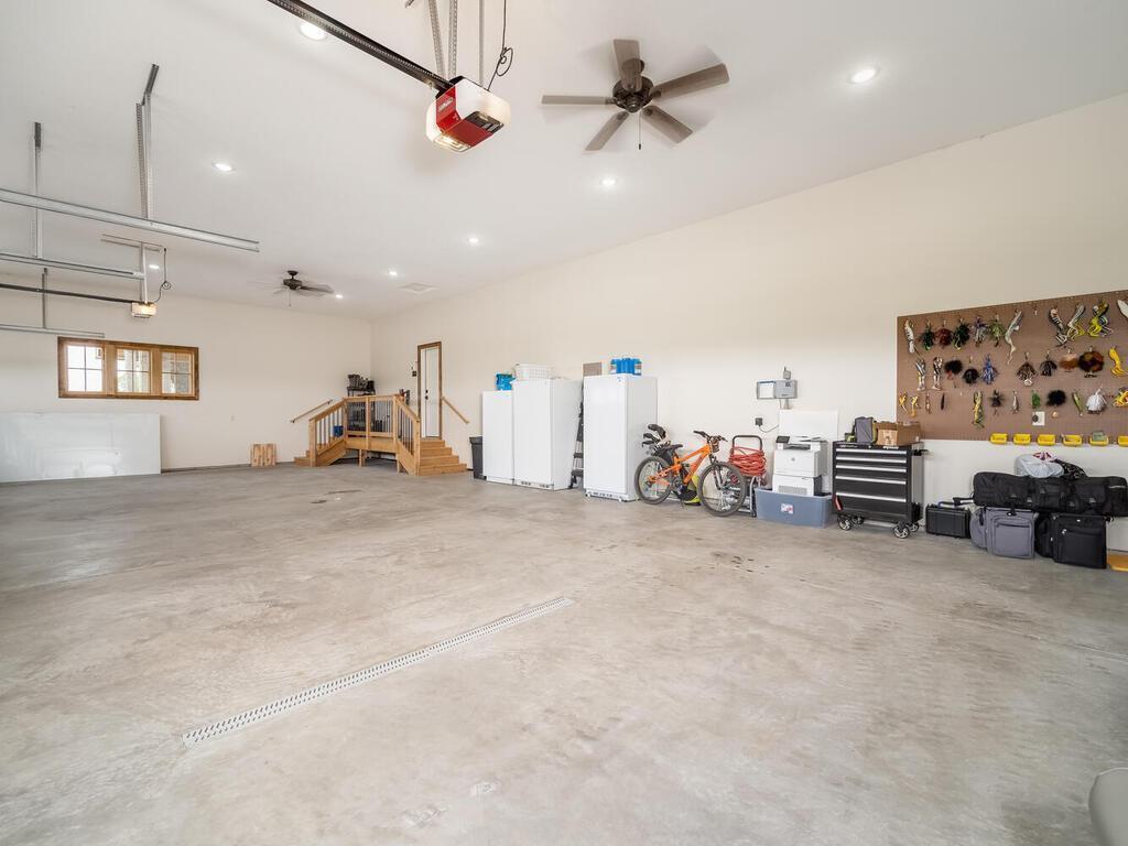 Finished four stall garage with in-floor heat.