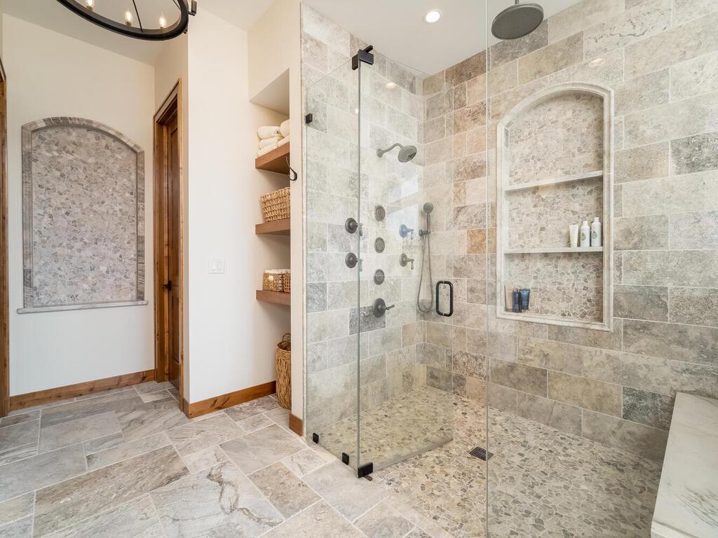 Ceramic tile walk-in rain shower.