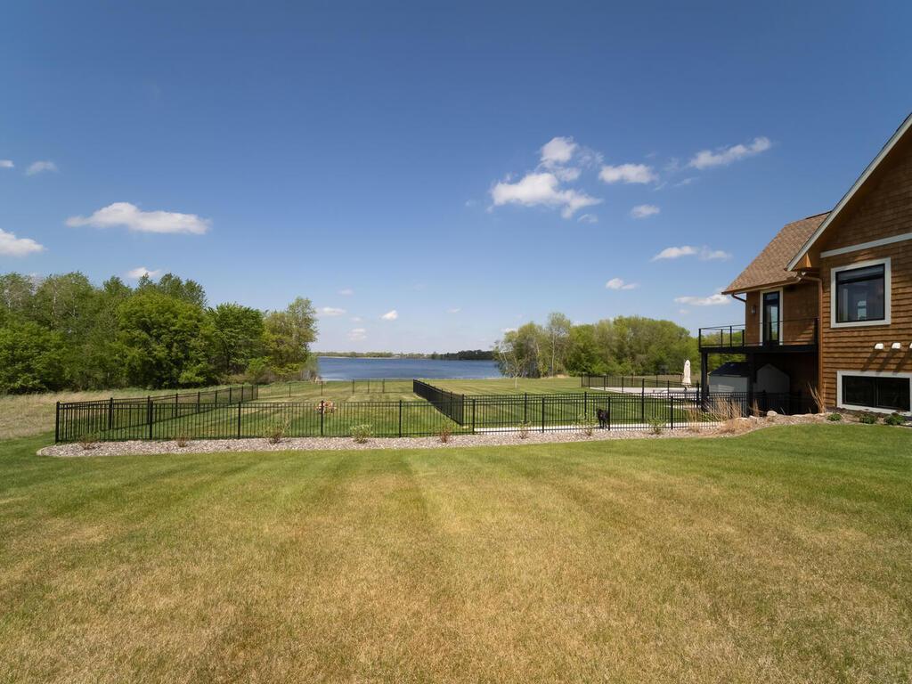 The dogs even have their own private dog yard with protective matting underneath. (No digging!)