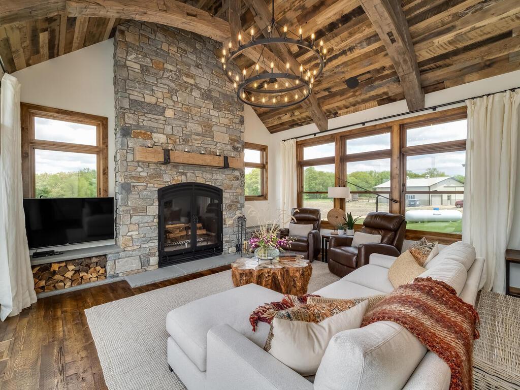 Massive wood burning fireplace to cozy up to all year long.