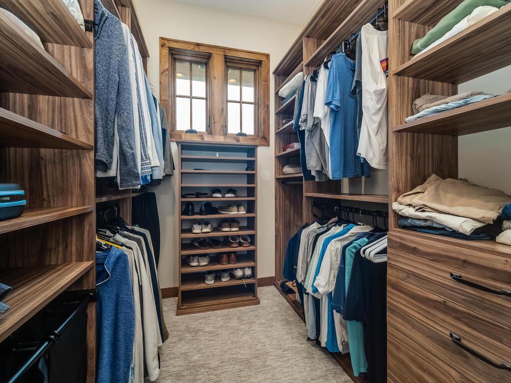 His & hers walk-in closets.
