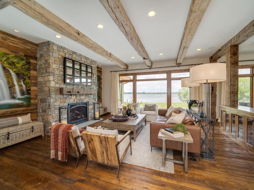 10' Beamed ceiling with hidden tv over the gas fireplace.