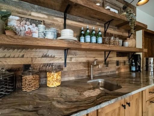 Full wet bar with built-in beverage drawer.