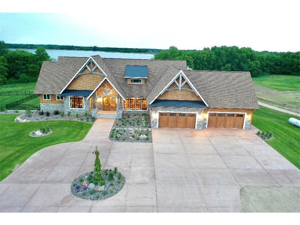 Extensive landscaping surrounds home.