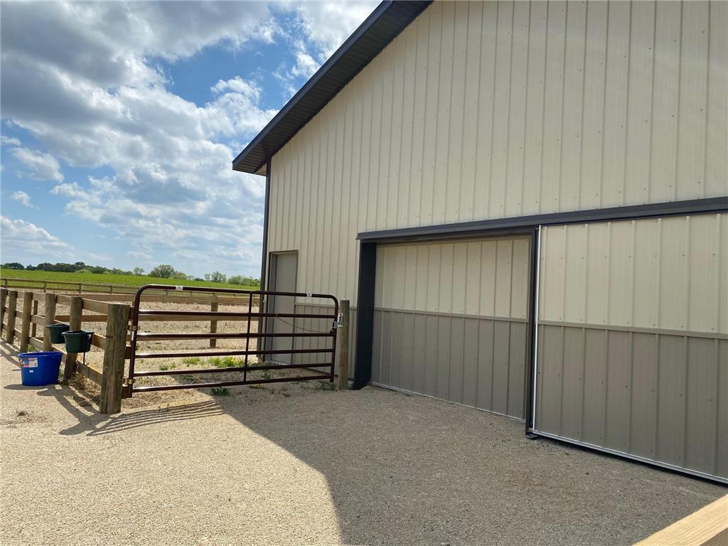 Run-in door for the horses with tack room.