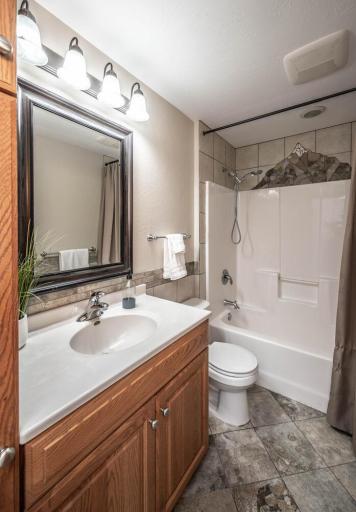 Full bathroom on the main level conveniently located right by the bedroom.