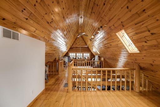 Custom staircase brings you to the third level with skylights