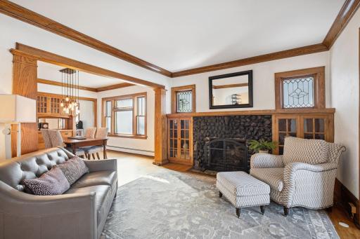 Cozy, open main floor is flooded with natural morning light. Warm up by the gas fireplace.
