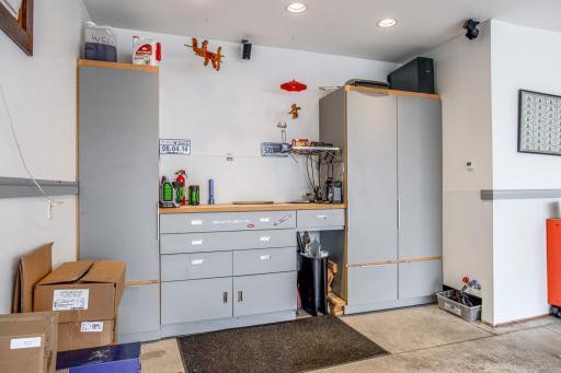 Workshop area in the Garage with tons of storage and soft-close drawers, hot/cold softened water spigots for washing cars and/or toys, plus a Bose 5-Channel Surround-Sound with Subwoofer.
