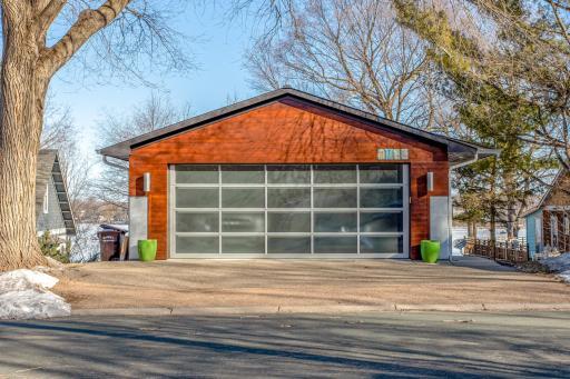 In-floor Garage heating, plus a ceiling mounted forced air gas heater, perfect for Minnesota winters!