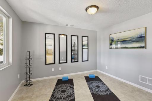 This lower level space makes a great home gym or office (there's not a closet so it's not counted as a bedroom).