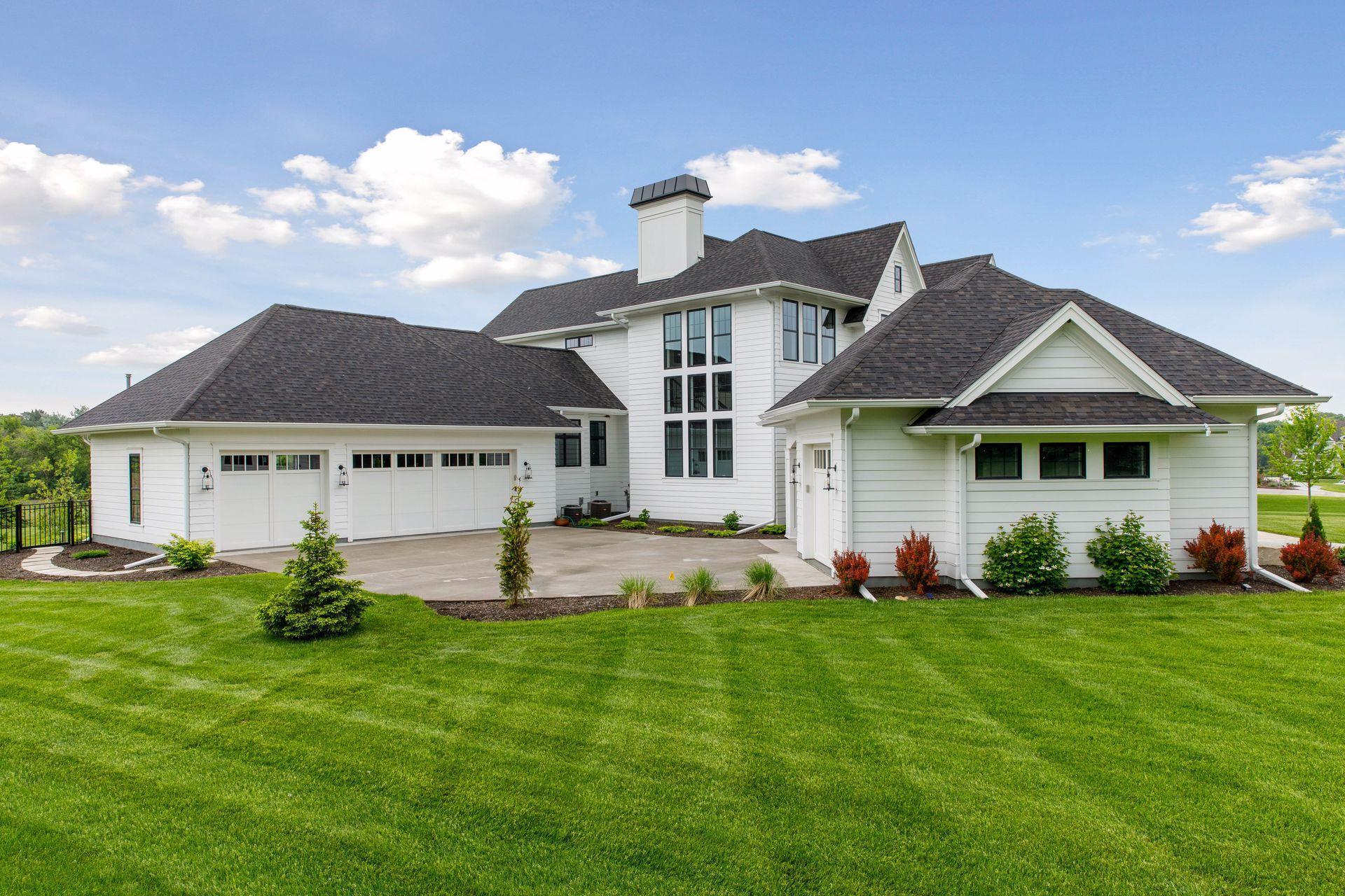 3 car heated garage with floor drains