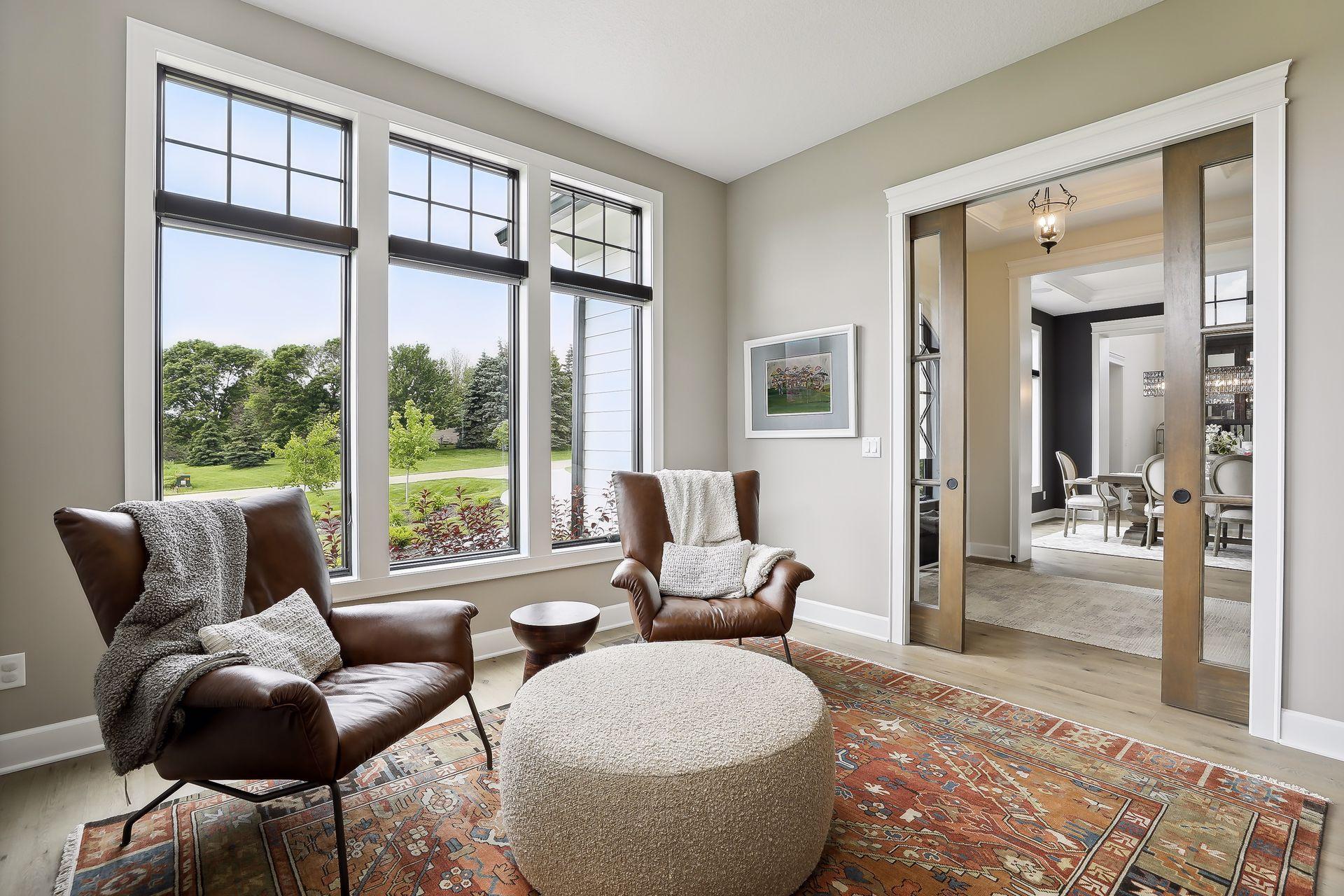 Floor to ceiling windows in den