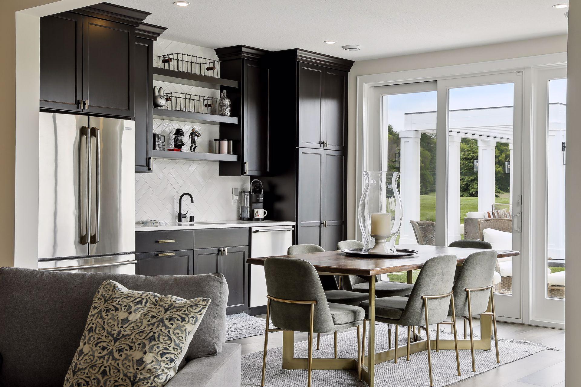 Lower level kitchen and eating area off the pool