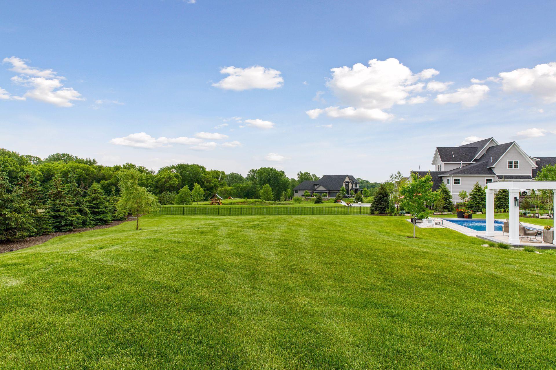 fully fenced yard with huge green space