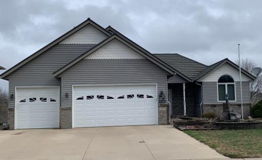 Exterior, concrete driveway, extended third garage stall, great curb appeal!